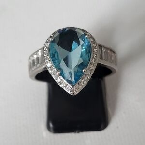 Stunning Teardrop Blue Gemstone Halo Ring